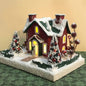 Susan B Snow Covered Sugar House with Snowman On a Snowflake Christmas Tree Ornament